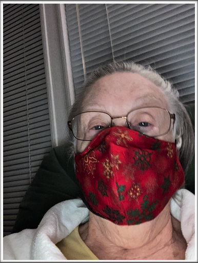 RED Christmas Mask.  Christmas masks were made from Left-over quilting material mu sister Margaret sent.